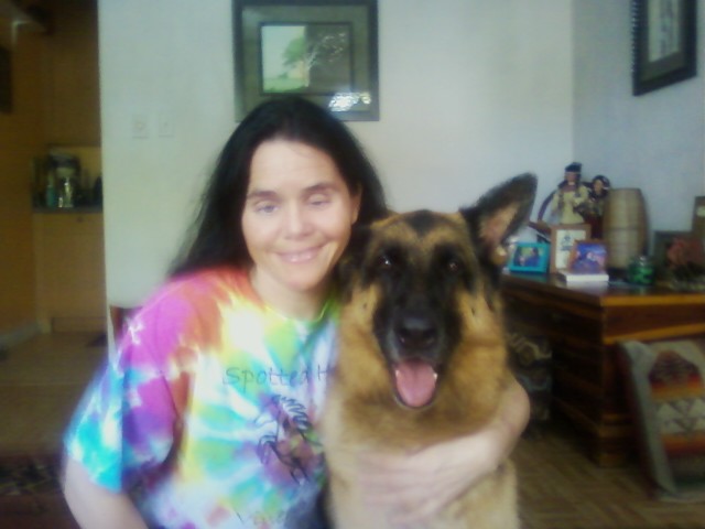Amy Krout-Horn, blind Native American author of My Father's Blood, and her German Shepherd Bella: photo by Gabriel Horn